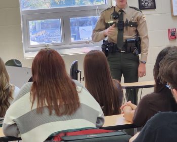 State trooper speaks to students in a classroom