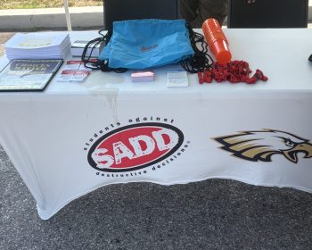 SADD table with traffic safety handouts and giveaways